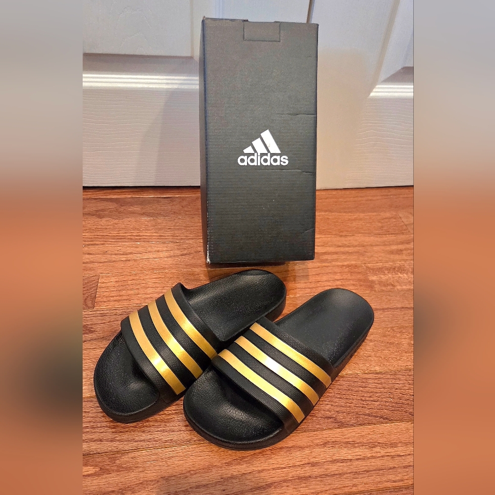 Adidas Black Slides with Gold Stripes